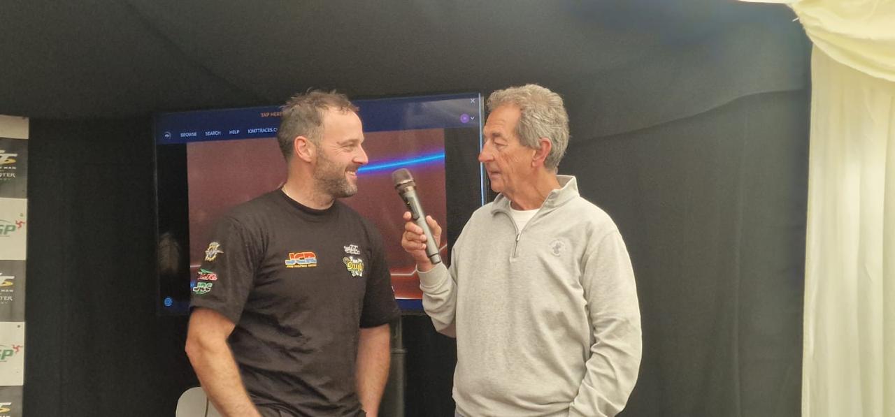 Rider interview taking place inside the TT corporate event marquee