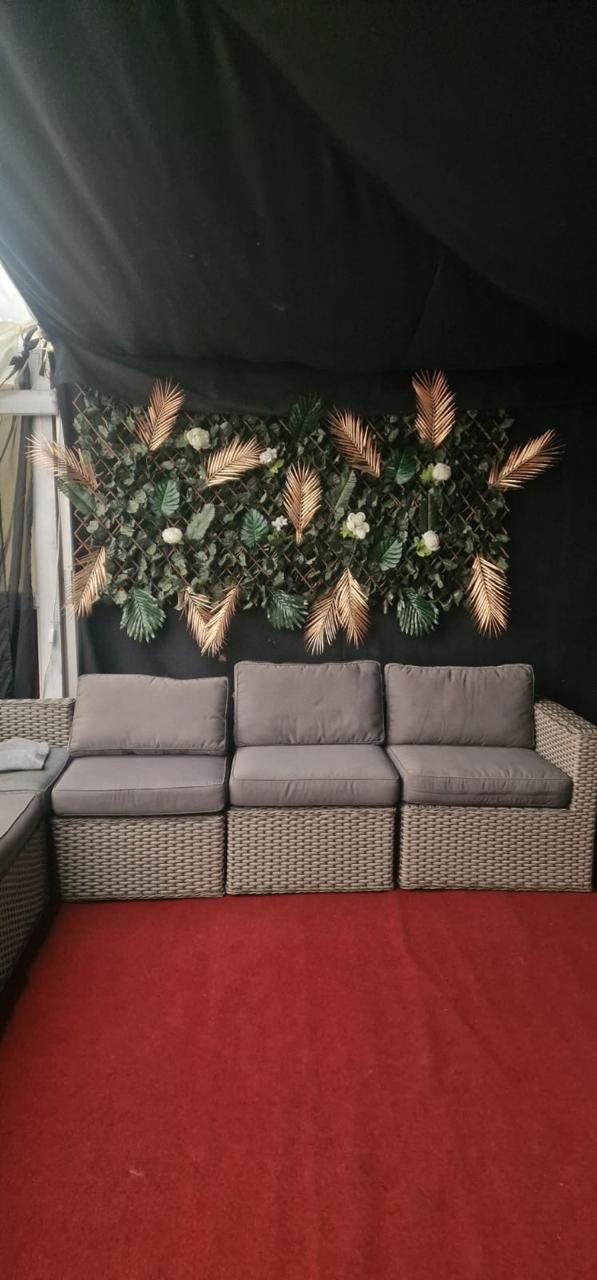 Seating and table layout inside the TT corporate hospitality marquee